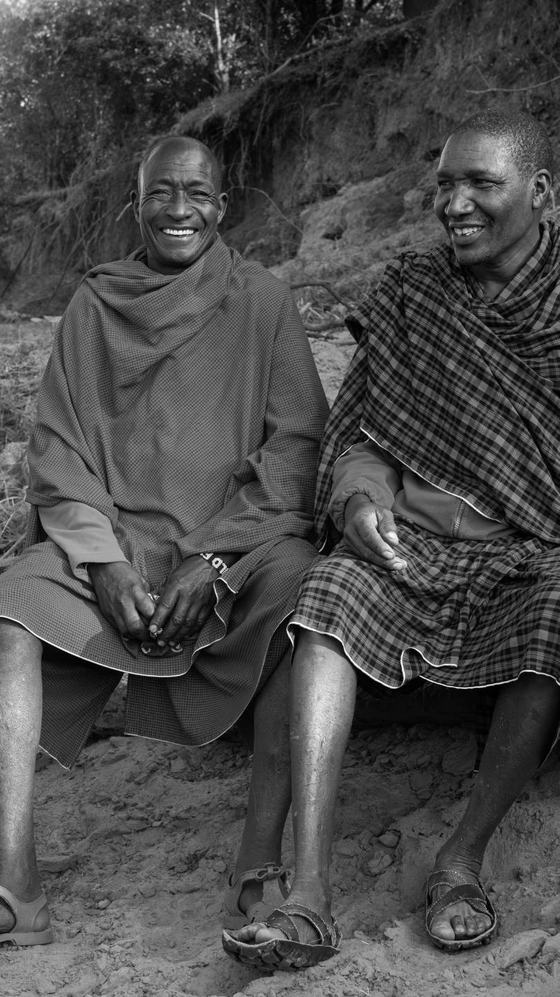 Enkishui staff members by the river