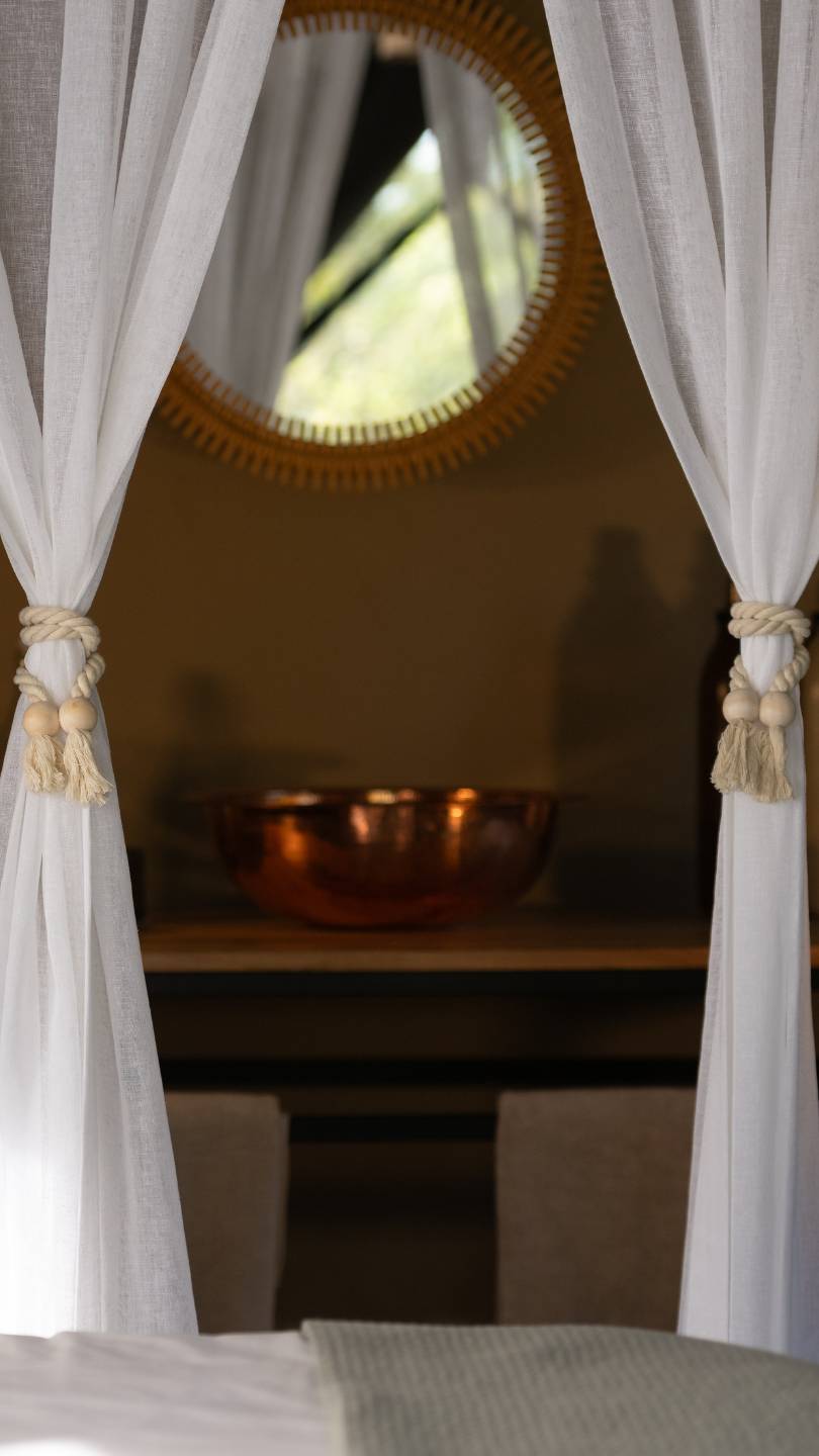 A view into the bathroom of a guest safari tent at enkishui Safari Camp